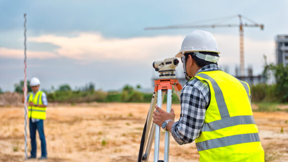 Site engineer doing measurements